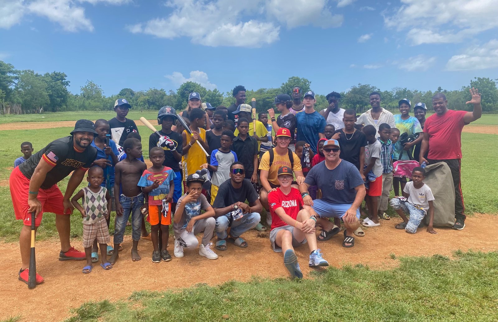 Home2First baseball community gathered on the field